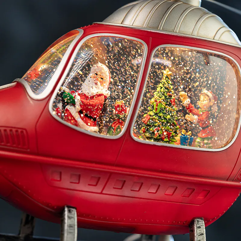 回転式ヘリコプターのオルゴール付きクリスタルスノードーム、男 - Snow Globe Musical のレビューと価格
